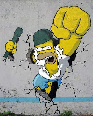 Graffitti de Homero Simpson rompiendo el muro