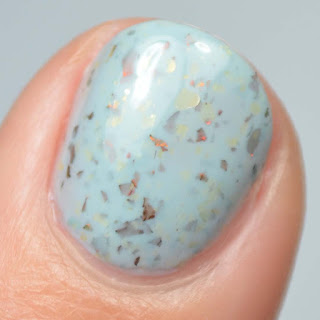 sky blue nail polish with flakies