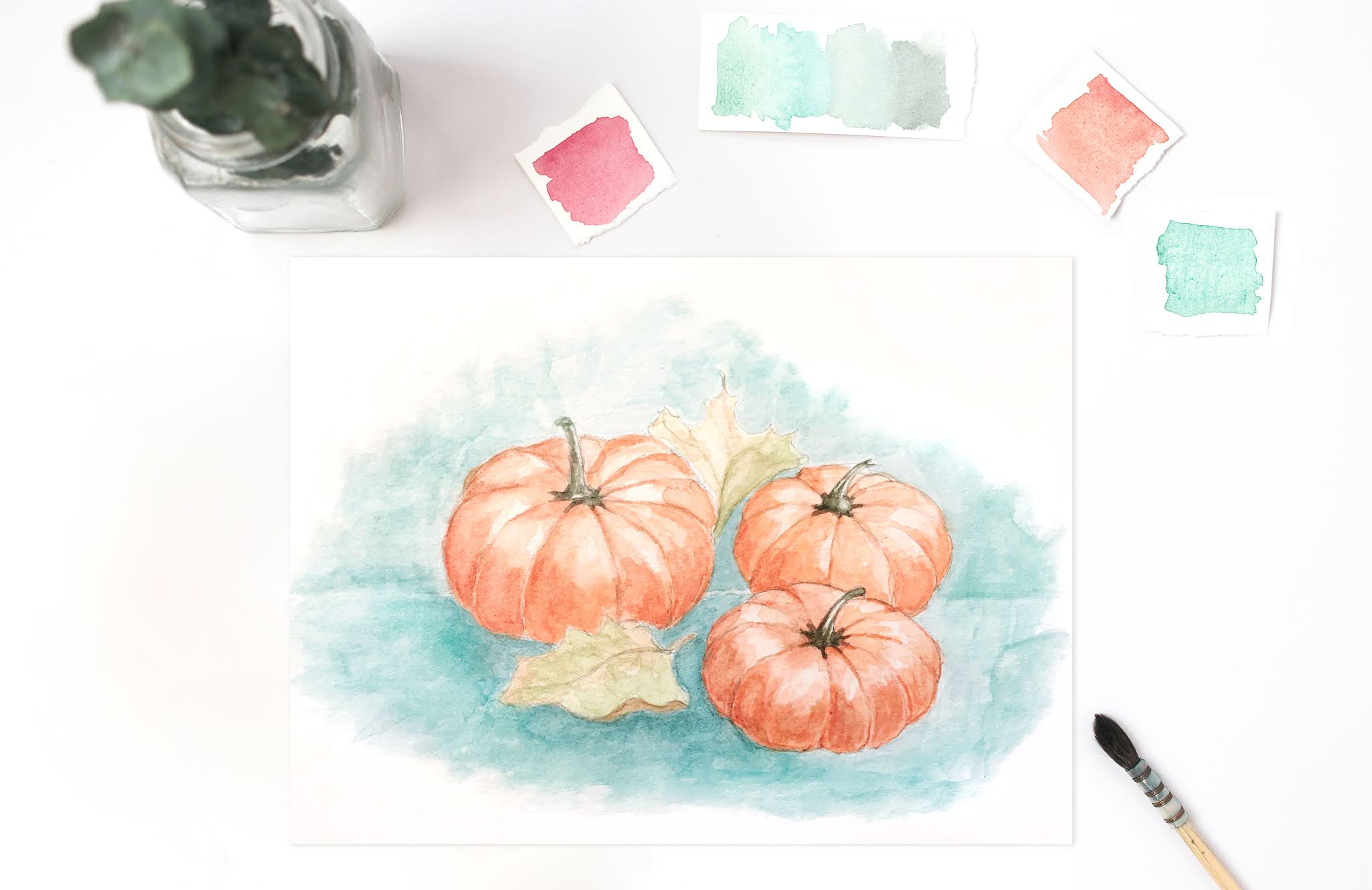 Three Watercolor Pumpkins on a White Background