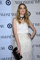 Jaime King in feather skirt over a silk white top paired at the Who What Wear x Target Launch Party red carpet dress