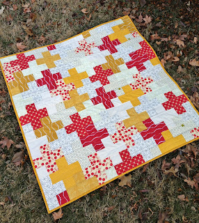 http://ablueskykindoflife.blogspot.com/2015/01/love-plus-baby-quilt-finish.html