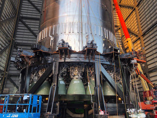 At SpaceX's launch site in Starbase, Texas, all 29 Raptor engines are now installed on Super Heavy Booster 4.