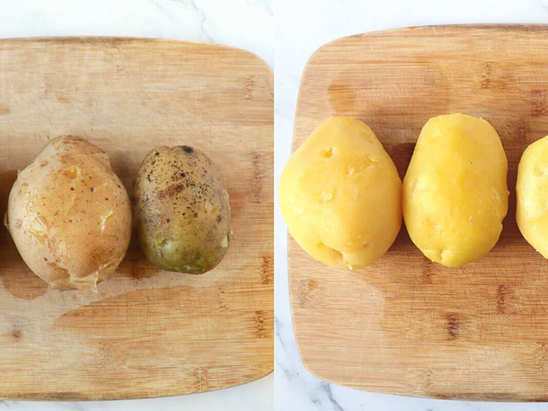 Boiled potatoes with the skin on and then peeled.