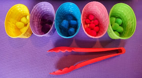 Easter sensory bin pom pom color matching and fine motor