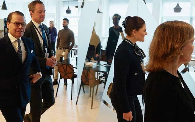Crown Princess Victoria wore a vertical striped bow blouse by Gant, and navy blue metal button tweed jacket by Zara