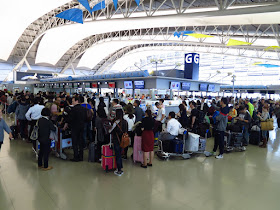 Crowd at Osaka Kansai KIX International Airport. Tokyo Consult. TokyoConsult.