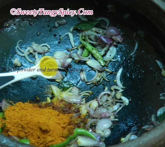 Sautéing red chili powder and turmeric powder with aromatic ingredients in coconut oil