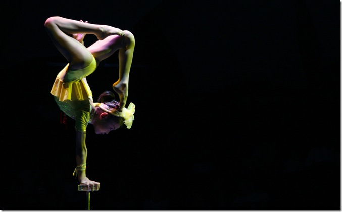 A young female gymnast performs at Shanghai Circus World in Shanghai, China.