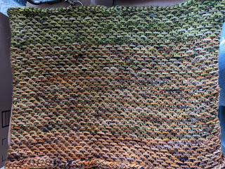 THe 20th Honey Cowl I made -- green and orange yarn from Stranded Dyeworks.