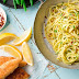 Almond crumbed chicken schnitzel with herb buttered spaghetti Recipe