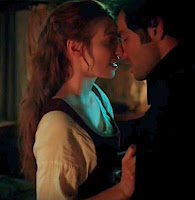 Ross and Demelza Poldark kissing in the stocking scene