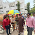  Faridpur DC distributed various items including umbrellas among the rickshaw workers