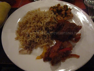 Biriyani, Kadai Chicken, lamb salad buffet items at Flame & Grill South City Kolkata