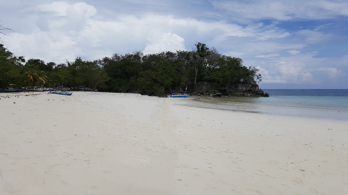 southern end of Gumasa Beach Sarangani A 3.7 mile long untouched white sandy beach by a forest