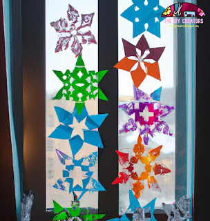 Snowflakes: A window decorated with paper snowflakes in different colors and patterns.