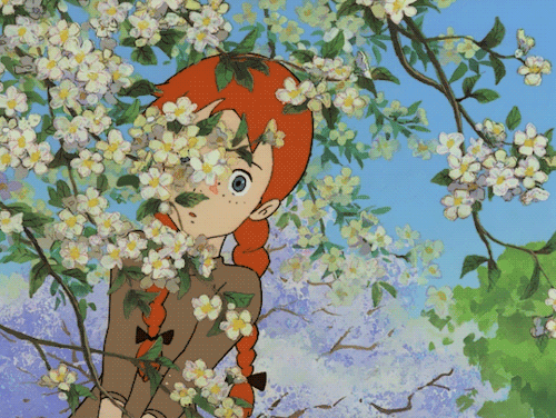 Animated drawing of Anne Shirley peeking from behind a tree and smiling from Akage no An, the anime production of Anne of Green Gables