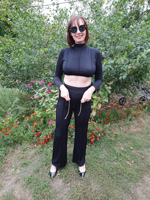 https://femmeluxe.co.uk/black-high-neck-long-sleeve-crop-top-high-waisted-trousers-seam-detail-co-ord-selah