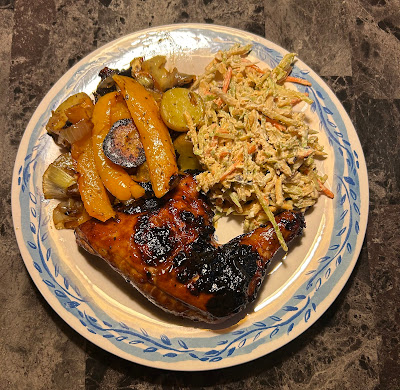 Hatch chile barbecued chicken, pan roasted baby potatoes with onions, peppers and mushrooms, and fresh broccoli slaw