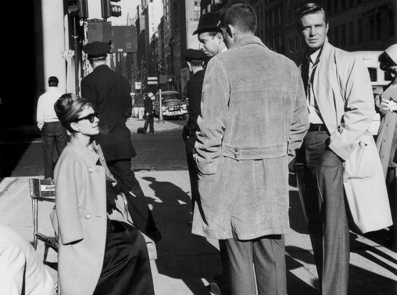 Audrey Hepburn and George Peppard on location during