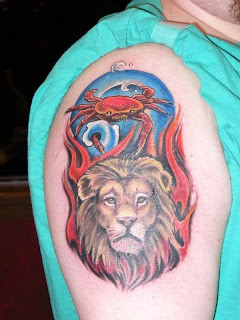 Leo Zodiac Tattoos Desaign On Arm With Cancer Zodiac Tattoo