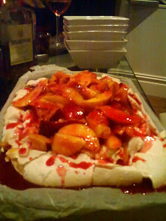fresh peach raspberry coulis pavlova meringue