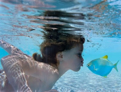 funny classic underwater fish photo kissing child