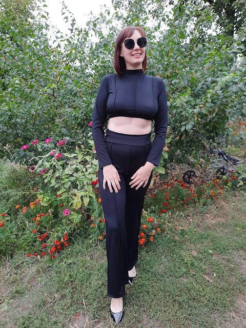 https://femmeluxe.co.uk/black-high-neck-long-sleeve-crop-top-high-waisted-trousers-seam-detail-co-ord-selah