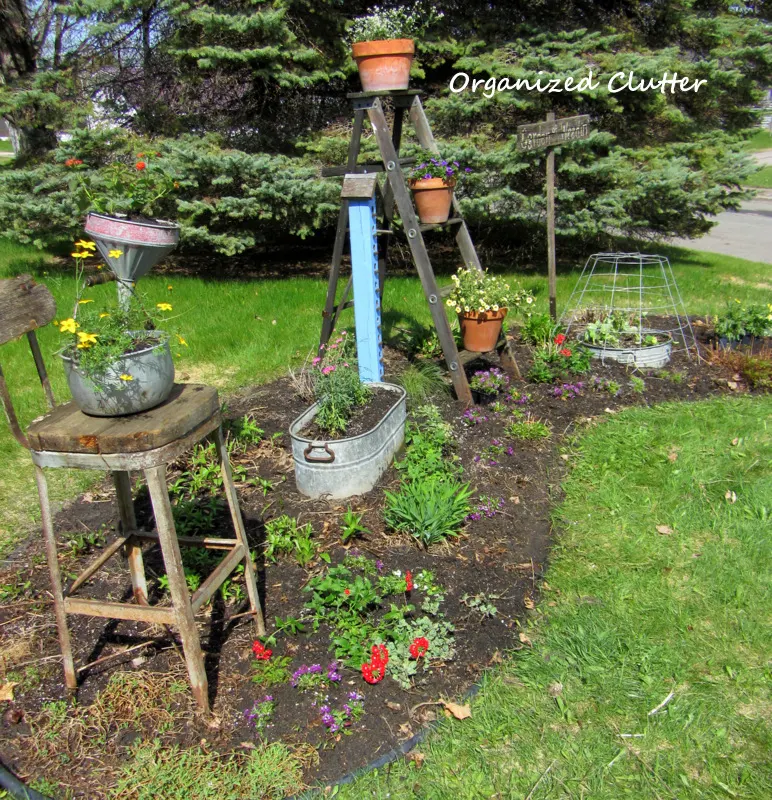 Annuals, Perennials, & Junk Garden Border www.organizedclutterqueen.blogspot.com