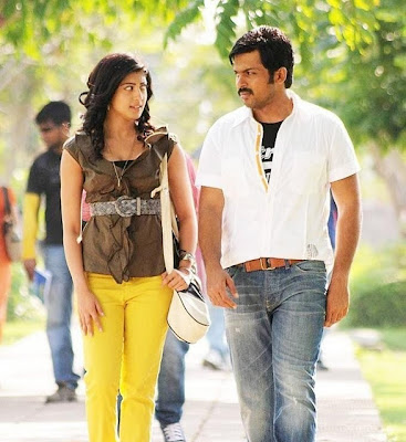 Karthi and Pranitha hot stills in Saguni