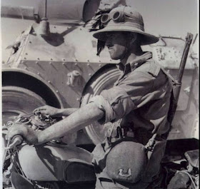 A Bersagliere on the Motoguzzi,and beside an Autoblinda AB-41, North Africa