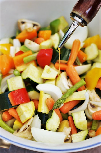 Drizzling Vegetables with Olive Oil Image