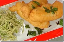 Filetti di baccalà con insalatina di puntarelle