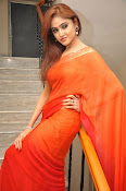 Sony Charista Glamorous in Saffron saree-thumbnail-4