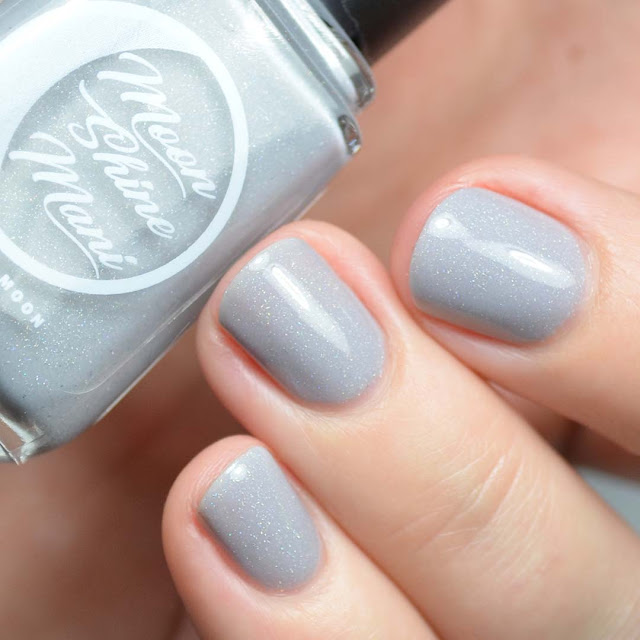 light grey nail polish with holographic shimmer