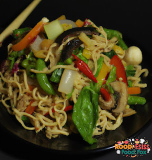 The finished dish is a colorful and delicious Asian Noodle Salad that is sure to impress.