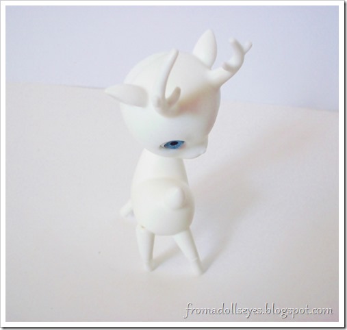 A ball jointed deer chasing it's tail.  Cute!