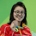 20-year-old Chinese swimmer had a funny, subdued reaction to finding out she won a medal
