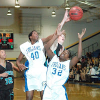 Karl Agenore (40) and Albert Smith (32)rebound