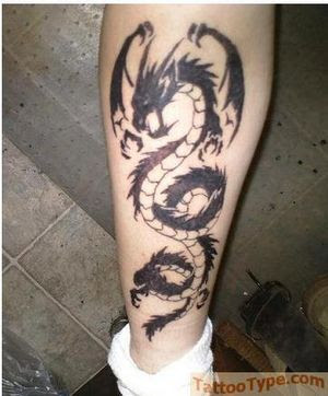 Dragon leg tattoo