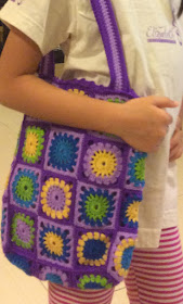 Colorful crochet granny square bag