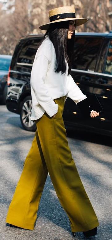 what to wear with a hat : white top + olive pants + bag + heels