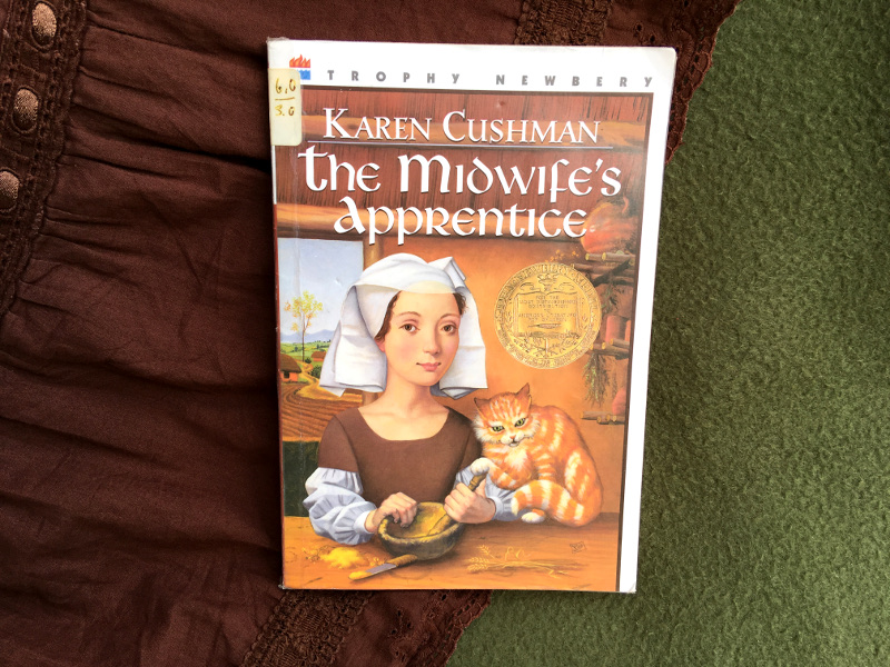 Review of The Midwife's Apprentice by Karen Cushman | Lydia Sanders #TwistyMustacheReviews