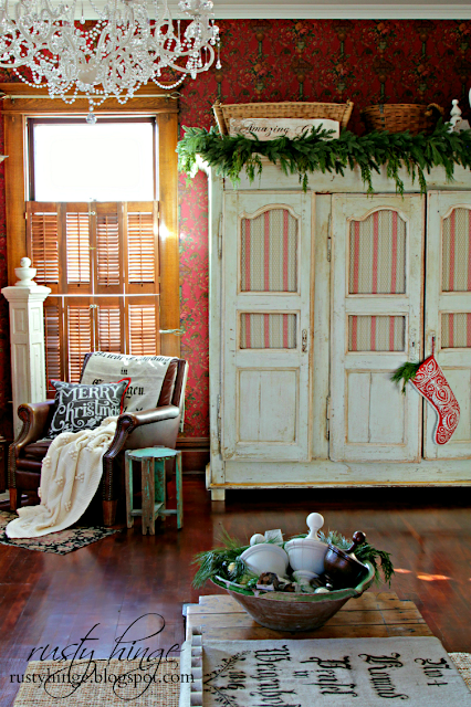 Rusty Hinge Christmas living room with antique French linen armoire