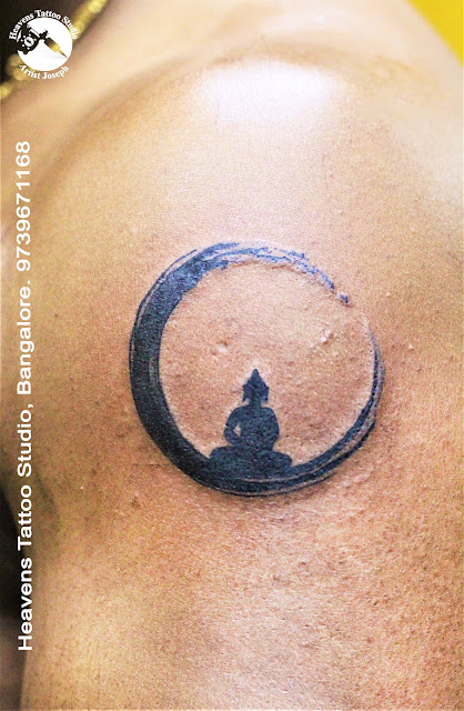 http://heavenstattoobangalore.in/small-buddha-tattoo-at-heavens-tattoo-studio-bangalore/