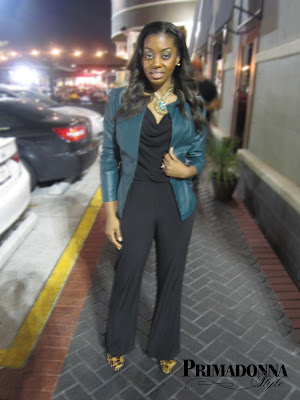 Faux leather jacket with leopard booties and black jumpsuit