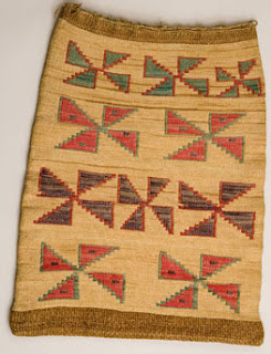 Nez Perce bag with symbols consisting of four triangles arranged in a swastika-like manner.