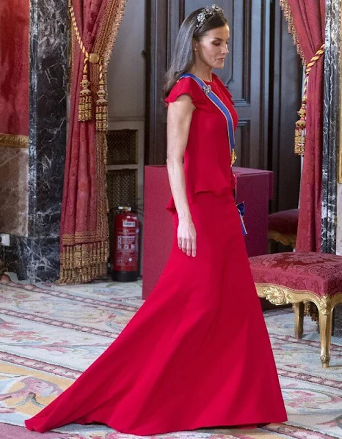 Queen Letizia wore a new red peplum maxi dress. Diamond tiara. Diamond earrings. Colombian First Lady Veronica Alcocer