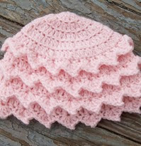 http://www.ravelry.com/patterns/library/shabby-chic-baby-blossom-hat