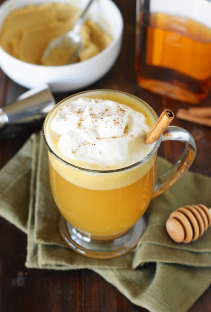 Honey Hot Buttered Rum ~ Loaded with the flavors of spiced rum, warm butter, and the sweetness of honey, it's the perfect comforting cocktail for holiday and Winter sipping.   www.thekitchenismyplayground.com