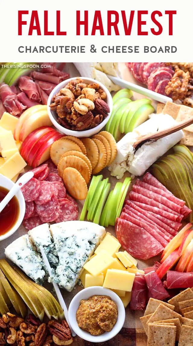 Learn how to make an easy charcuterie board to celebrate the fall season with cured meats, cheese, fruits, nuts & crackers! It's simple to build one in 30 minutes or less & you can make it small or large. This particular board features cheeses & meats from Trader Joes but you can use whatever you have on hand or just browse the pictures for ideas! This platter makes an eye-catching appetizer or snack board for Halloween, Thanksgiving, Christmas, game day, a wedding, or autumn entertaining.